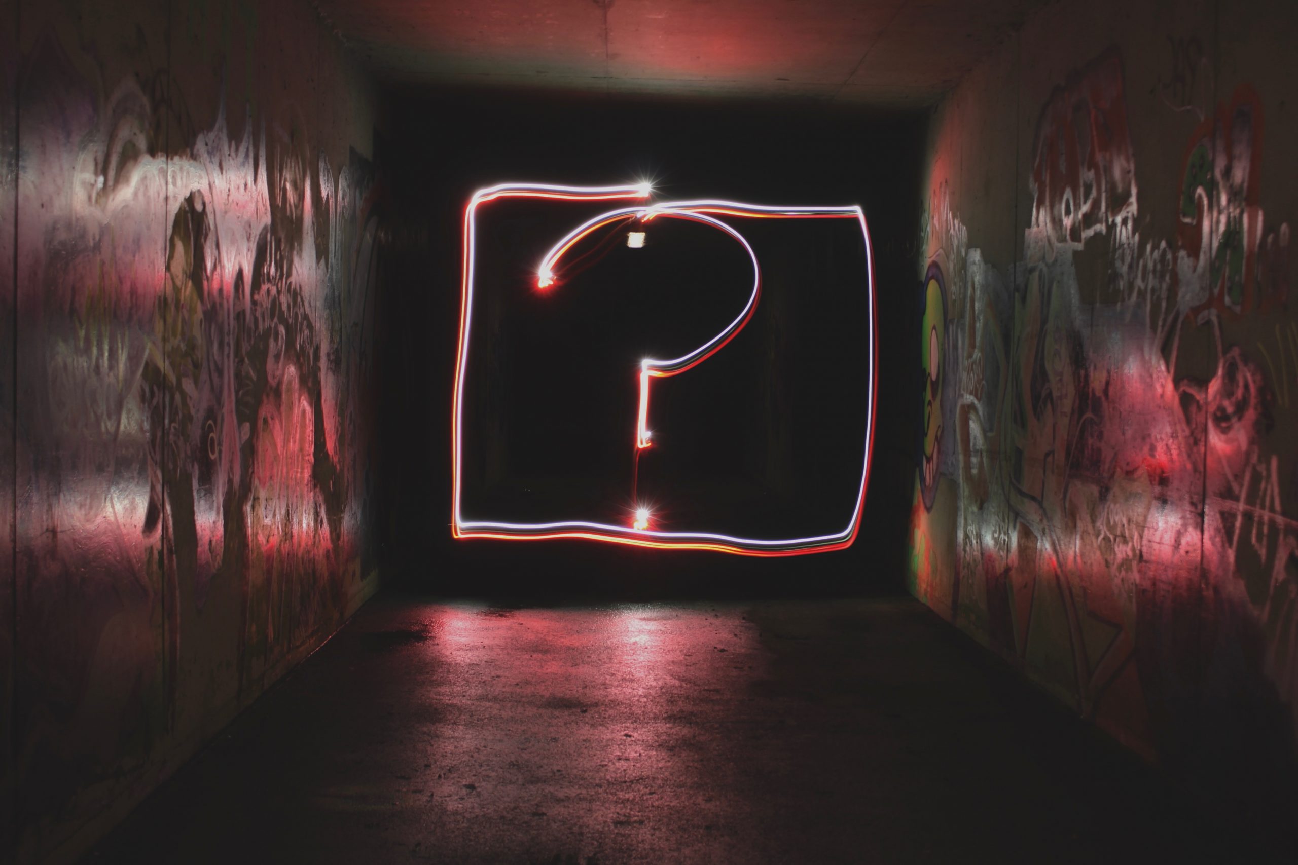 red neon question mark sign